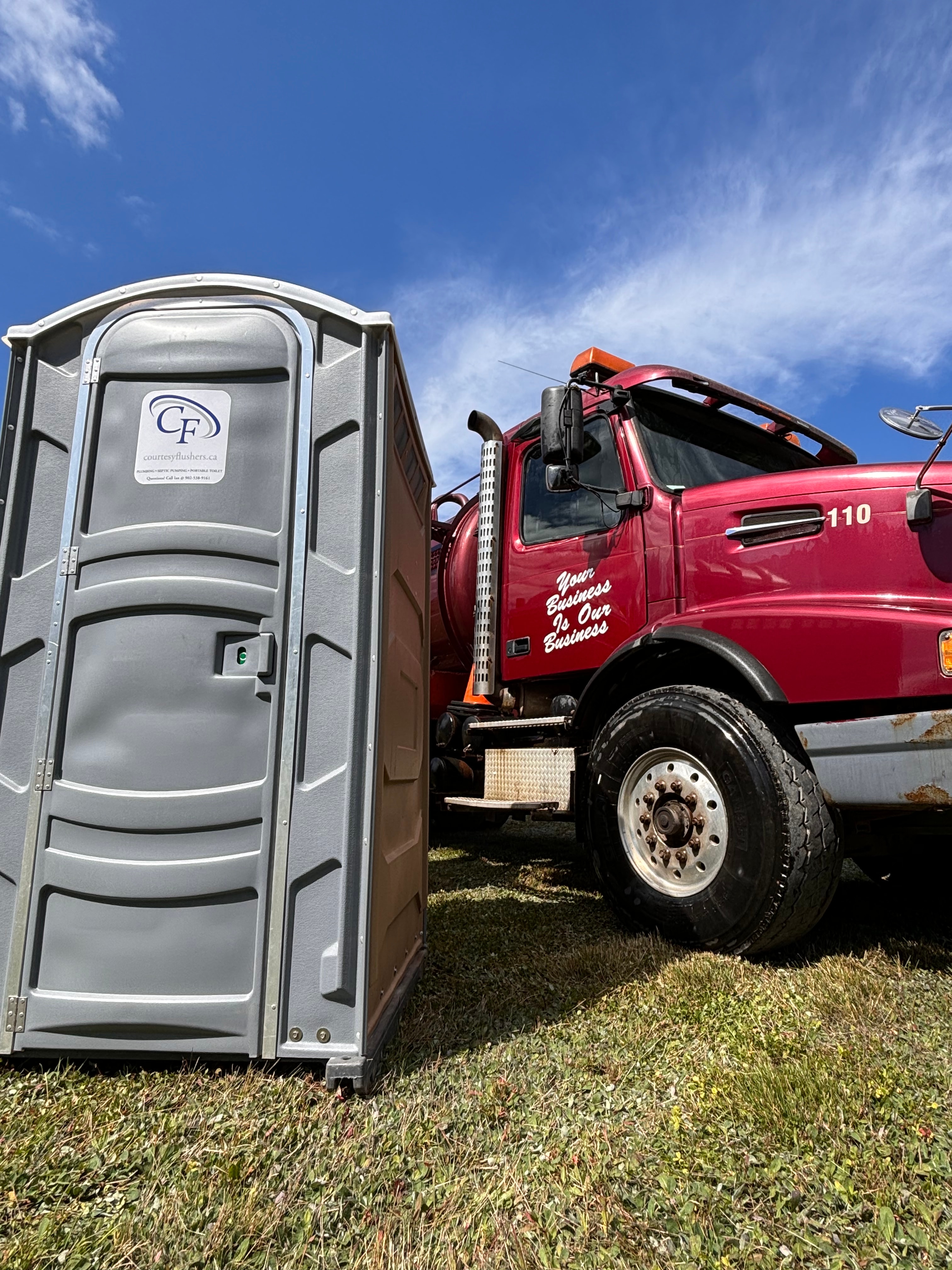 Courtesy Flushers portable toilet service truck